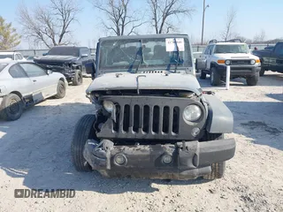 2014 Jeep Wrangler Sport with VIN 1C4AJWAG5EL271318, listed as a IAAI auction lot 41780040 with 128,942 mi miles and . Bid and sale history available at DreamBid. Image 12.