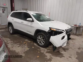 2016 Jeep Cherokee Latitude with VIN 1C4PJMCB1GW119621, listed as a IAAI auction lot 41310872 with 123,841 mi miles. Bid and sale history available at carsss.com. Image 1.
