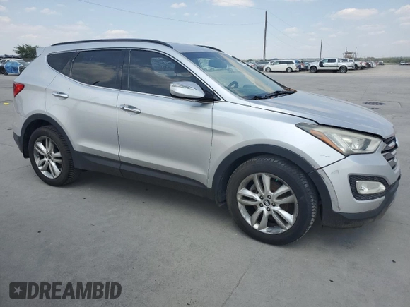 2013 Hyundai Santa Fe Sport z VIN 5XYZUDLA2DG069389, wystawiony jako Copart lot #64054684 z przebiegiem 162 861 mil mil oraz Szkoda całkowita • Salvage title. Historia ofert i sprzedaży dostępna na DreamBid. Obrazek 4.
