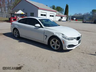 2014 BMW 4 Series 428i xDrive with VIN WBA3N5C55EK196898, listed as a IAAI auction lot 42112580 with 184,381 mi miles. Bid and sale history available at carsss.com. Image 1.