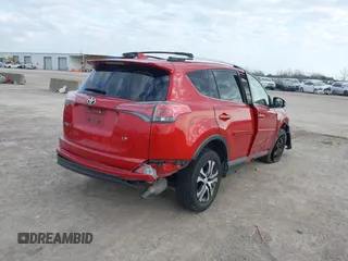 2016 Toyota RAV4 LE with VIN JTMZFREV0GJ063201, listed as a IAAI auction lot 41160385 with 190,190 mi miles. Bid and sale history available at carsss.com. Image 4.