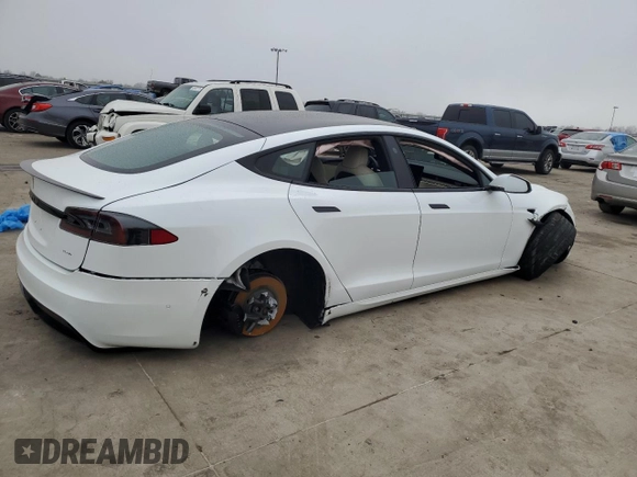 2021 Tesla Model S Plaid с VIN 5YJSA1E6XMF455258, выставлен на аукционе Copart как лот 43788675 с пробегом Не указан миль и Списание • Salvage title. История ставок и продаж доступна на DreamBid. Изображение 3.