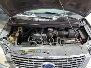 2004 Ford Freestar Limited z VIN 2FMDA58254BA54752, wystawiony jako Copart lot #89195235 z przebiegiem Nie podano mil oraz Szkoda całkowita • Salvage title. Historia ofert i sprzedaży dostępna na DreamBid. Obrazek 12.
