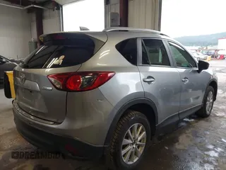 2015 Mazda CX-5 Sport z VIN JM3KE2BE8F0434889, wystawiony jako IAAI lot #42259894 z przebiegiem 298 835 mil mil oraz . Historia ofert i sprzedaży dostępna na DreamBid. Obrazek 4.