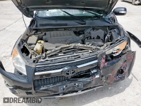 2010 Toyota RAV4 Limited with VIN JTMYK4DV2AD004281, listed as a Copart auction lot 58244815 with 137,913 mi miles and Salvage title. Bid and sale history available at DreamBid. Image 12.