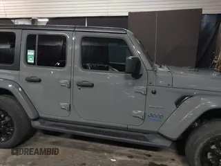 2022 Jeep Wrangler Unlimited Sahara with VIN 1C4JJXP66NW198723, listed as a IAAI auction lot 41368728 with 31,814 mi miles and . Bid and sale history available at DreamBid. Image 13.