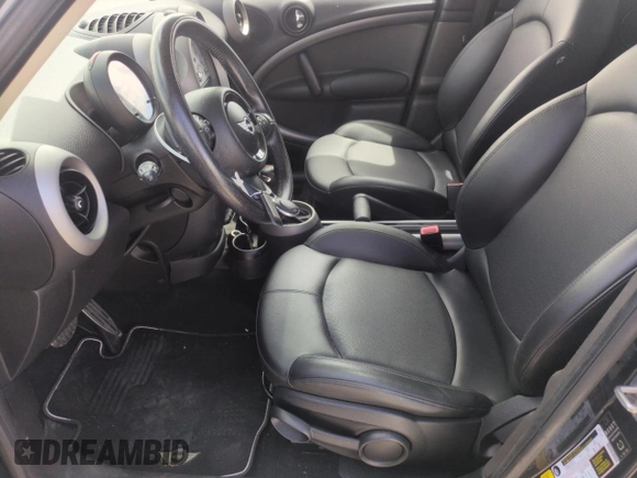 2012 MINI Countryman S with VIN WMWZC3C57CWL87894, listed as a Copart auction lot 56683985 with 54,032 mi miles and Salvage title. Bid and sale history available at DreamBid. Image 7.