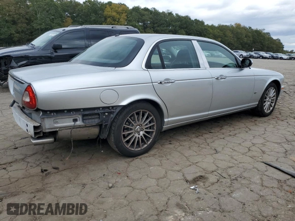 2007 Jaguar XJ with VIN SAJWA71B17SH14626, listed as a Copart auction lot 71013573 with 156,134 mi miles and Salvage Title. Bid and sale history available at carsss.com. Image 3.