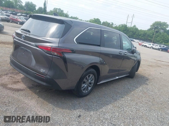2021 Toyota Sienna XLE with VIN 5TDYSKFC9MS014413, listed as a IAAI auction lot 42449852 with 111,712 mi miles and . Bid and sale history available at DreamBid. Image 4.