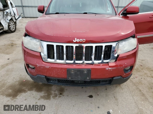 2011 Jeep Grand Cherokee Laredo with VIN 1J4RR4GG7BC701623, listed as a Copart auction lot 50833135 with 268,773 mi miles and Salvage Title. Bid and sale history available at DreamBid. Image 14.