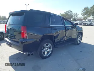 2018 Chevrolet Tahoe LT with VIN 1GNSCBKCXJR132867, listed as a IAAI auction lot 41456319 with 59,131 mi miles and . Bid and sale history available at DreamBid. Image 4.