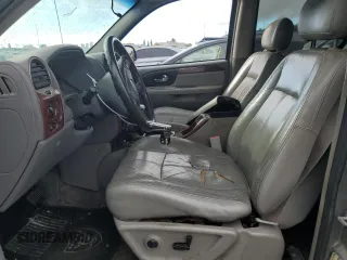 2005 GMC Envoy SLT with VIN 1GKDS13S852320018, listed as a Copart auction lot 80496544 with 237,451 mi miles and Salvage Title. Bid and sale history available at carsss.com. Image 7.