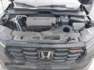 2025 Honda Pilot TrailSport with VIN 5FNYG1H61SB026477, listed as a IAAI auction lot 41471719 with 12,624 mi miles and . Bid and sale history available at DreamBid. Image 10.