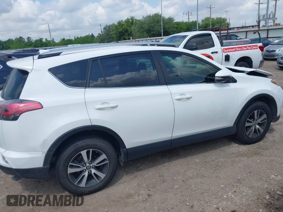 2017 Toyota RAV4 XLE with VIN JTMWFREV8HJ118885, listed as a IAAI auction lot 42097180 with 122,481 mi miles. Bid and sale history available at carsss.com. Image 14.