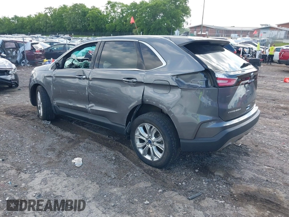 2021 Ford Edge Titanium z VIN 2FMPK3K9XMBA21766, wystawiony jako IAAI lot #42187940 z przebiegiem 79 732 mil mil oraz . Historia ofert i sprzedaży dostępna na DreamBid. Obrazek 3.