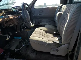 1993 Toyota T100 z VIN JT4VD20C5P0005978, wystawiony jako Copart lot #80282574 z przebiegiem Nie podano mil oraz Szkoda całkowita • Salvage title. Historia ofert i sprzedaży dostępna na DreamBid. Obrazek 7.