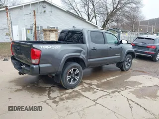2017 Toyota Tacoma SR5 with VIN 3TMCZ5AN3HM113332, listed as a IAAI auction lot 41757467 with 199,846 mi miles. Bid and sale history available at carsss.com. Image 4.