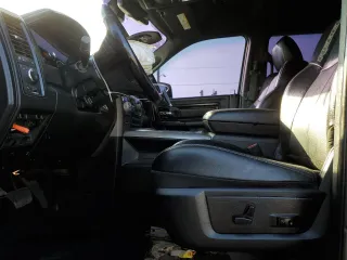 2018 Ram 1500 Rebel z VIN 1C6RR7YT1JS161619, wystawiony jako Copart lot #58272215 z przebiegiem 49 567 mil mil oraz Szkoda całkowita • Salvage title. Historia ofert i sprzedaży dostępna na DreamBid. Obrazek 7.