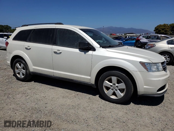 2013 Dodge Journey American Value with VIN 3C4PDCAB2DT547459, listed as a Copart auction lot 61217605 with 116,740 mi miles and Clean title. Bid and sale history available at DreamBid. Image 4.