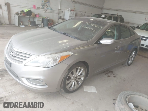2012 Hyundai Azera with VIN KMHFH4JG5CA002049, listed as a IAAI auction lot 42164271 with 190,980 mi miles. Bid and sale history available at carsss.com. Image 2.
