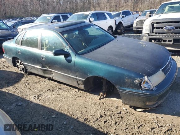 1998 Toyota Avalon XL with VIN 4T1BF18B5WU281065, listed as a Copart auction lot 49978705 with Not Provided miles and Salvage Title. Bid and sale history available at DreamBid. Image 4.