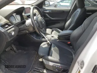 2018 BMW X2 xDrive28i z VIN WBXYJ5C35JEF80889, wystawiony jako Copart lot #57624455 z przebiegiem 80 012 mil mil oraz Szkoda całkowita • Salvage title. Historia ofert i sprzedaży dostępna na DreamBid. Obrazek 7.
