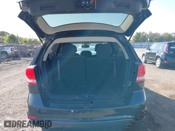 2013 Dodge Journey SXT with VIN 3C4PDCBG7DT710844, listed as a IAAI auction lot 40582910 with 136,741 mi miles and . Bid and sale history available at DreamBid. Image 8.