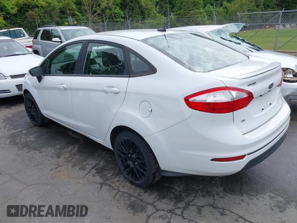 2019 Ford Fiesta SE z VIN 3FADP4BJ2KM143337, wystawiony jako IAAI lot #42179937 z przebiegiem 124 078 mil mil oraz . Historia ofert i sprzedaży dostępna na DreamBid. Obrazek 3.