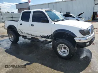 2002 Toyota Tacoma PreRunner with VIN 5TEGN92N02Z887650, listed as a Copart auction lot 49416255 with 290,615 mi miles and Salvage Title. Bid and sale history available at DreamBid. Image 4.