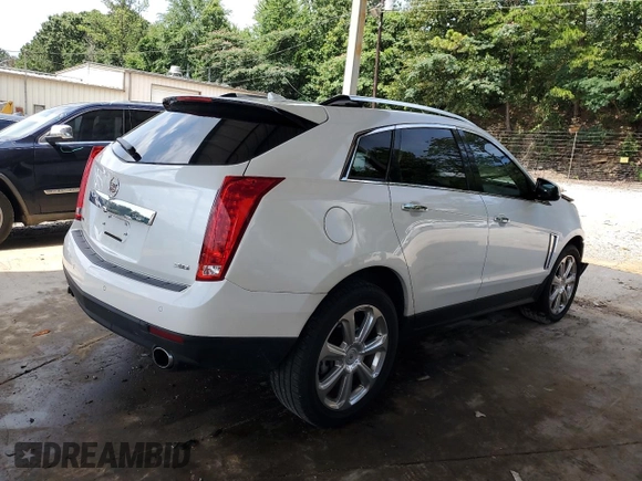 2013 Cadillac SRX Premium Collection with VIN 3GYFNEE30DS529808, listed as a Copart auction lot 61931185 with 131,245 mi miles and Salvage title. Bid and sale history available at DreamBid. Image 3.
