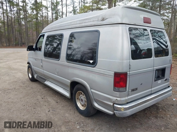 2002 Ford Econoline Cargo with VIN 1FDRE14W72HB82339, listed as a IAAI auction lot 41730429 with 214,165 mi miles and . Bid and sale history available at DreamBid. Image 3.