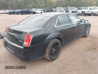 2013 Chrysler 300 with VIN 2C3CCABG4DH712280, listed as a IAAI auction lot 41471254 with 213,280 mi miles. Bid and sale history available at carsss.com. Image 4.