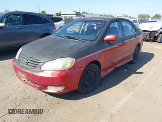 2003 Toyota Corolla CE with VIN 1NXBR32E83Z083002, listed as a IAAI auction lot 42229105 with 294,687 mi miles and . Bid and sale history available at DreamBid. Image 2.