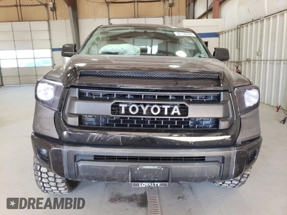 2016 Toyota Tundra SR z VIN 5TFUY5F11GX563129, wystawiony jako Copart lot #87130784 z przebiegiem 159 350 mil mil oraz Szkoda całkowita • Salvage title. Historia ofert i sprzedaży dostępna na DreamBid. Obrazek 5.