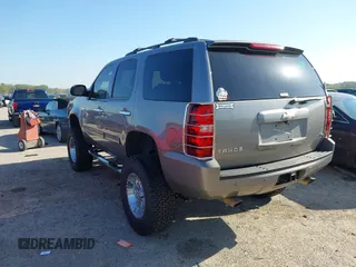 2009 Chevrolet Tahoe 2LT z VIN 1GNFC230X9R291177, wystawiony jako IAAI lot #41965944 z przebiegiem 71 073 mil mil oraz . Historia ofert i sprzedaży dostępna na DreamBid. Obrazek 3.