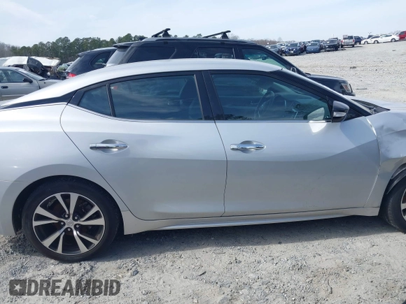 2018 Nissan Maxima S z VIN 1N4AA6APXJC360916, wystawiony jako IAAI lot #41543171 z przebiegiem 51 711 mil mil oraz . Historia ofert i sprzedaży dostępna na DreamBid. Obrazek 13.