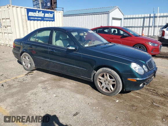 2003 Mercedes-Benz E-Class 3.2L with VIN WDBUF65J53A101021, listed as a Copart auction lot 73015774 with 242,812 mi miles and Clean Title. Bid and sale history available at carsss.com. Image 4.