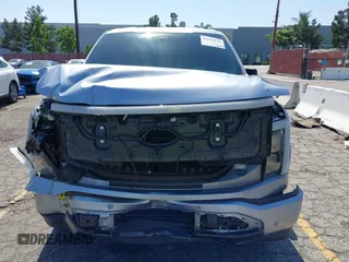 2022 Ford F-150 Lightning Pro с VIN 1FT6W1EV0NWG05515, выставлен на аукционе IAAI как лот 42343136 с пробегом 49 544 миль миль и . История ставок и продаж доступна на DreamBid. Изображение 12.