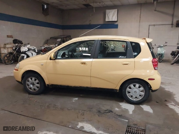 2005 Chevrolet Aveo LS with VIN KL1TD62655B310654, listed as a IAAI auction lot 41389685 with 107,879 mi miles. Bid and sale history available at carsss.com. Image 14.