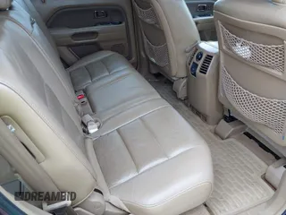 2007 Honda Pilot EX-L with VIN 5FNYF18537B021184, listed as a IAAI auction lot 42142092 with 245,462 mi miles. Bid and sale history available at carsss.com. Image 8.