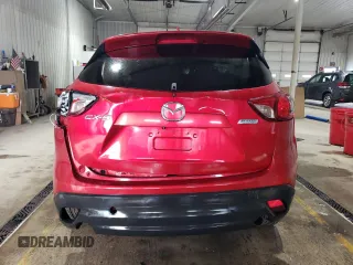 2014 Mazda CX-5 Touring with VIN JM3KE2CY4E0308973, listed as a Copart auction lot 53875605 with 0 mi miles and Salvage Title. Bid and sale history available at carsss.com. Image 6.