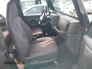 2002 Jeep Wrangler X with VIN 1J4FA39S92P774054, listed as a IAAI auction lot 41470351 with 209,727 mi miles. Bid and sale history available at carsss.com. Image 5.