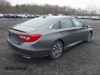 2020 Honda Accord Touring with VIN 1HGCV3F91LA009294, listed as a IAAI auction lot 41160588 with 84,937 mi miles and . Bid and sale history available at DreamBid. Image 4.