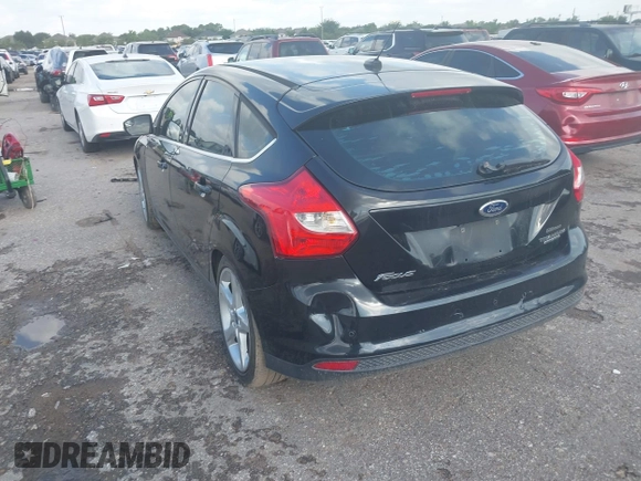 2014 Ford Focus Titanium z VIN 1FADP3N28EL208034, wystawiony jako IAAI lot #42426943 z przebiegiem 220 891 mil mil oraz . Historia ofert i sprzedaży dostępna na DreamBid. Obrazek 3.