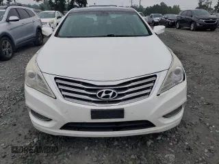 2013 Hyundai Azera z VIN KMHFH4JG2DA277122, wystawiony jako Copart lot #59899755 z przebiegiem 210 601 mil mil oraz Czysty tytuł • Clean title. Historia ofert i sprzedaży dostępna na DreamBid. Obrazek 5.