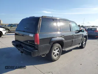 2000 Cadillac Escalade z VIN 1GYEK13R0YR167895, wystawiony jako Copart lot #82586443 z przebiegiem 267 099 mil mil oraz Szkody całkowita. Historia ofert i sprzedaży dostępna na DreamBid. Obrazek 3.