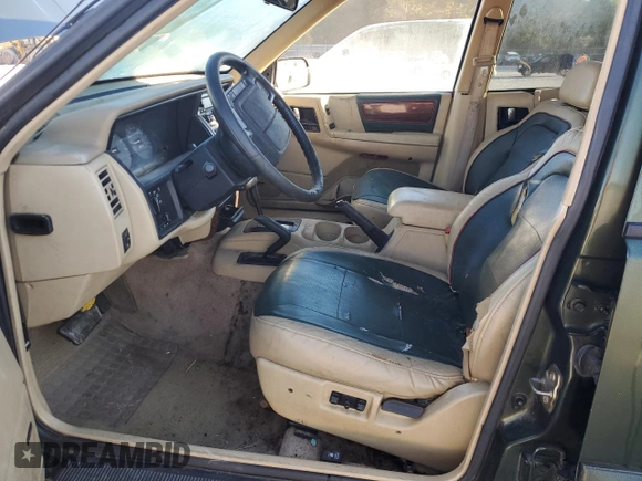 1995 Jeep Grand Cherokee Limited with VIN 1J4GZ78Y7SC730118, listed as a Copart auction lot 76031964 with 184,074 mi miles and Salvage Title. Bid and sale history available at carsss.com. Image 7.