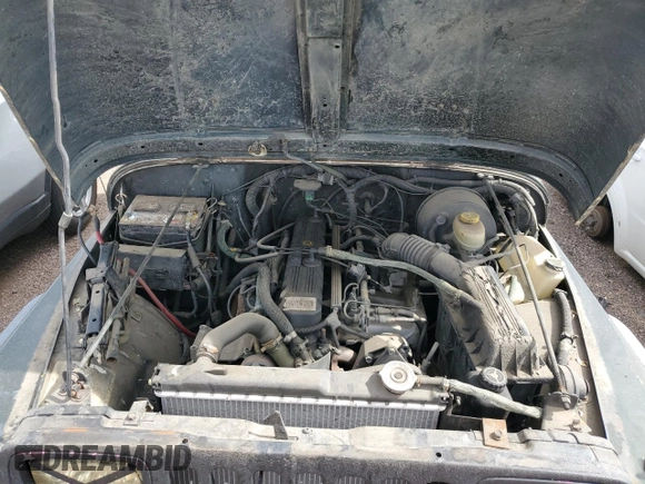 1995 Jeep Wrangler Sahara with VIN 1J4FY49S1SP256179, listed as a Copart auction lot 61137334 with 187,391 mi miles and Salvage Title. Bid and sale history available at carsss.com. Image 11.