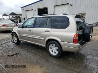 2002 Suzuki XL7 Standard z VIN JS3TY92V524101048, wystawiony jako Copart lot #77658264 z przebiegiem 226 279 mil mil oraz Szkoda całkowita • Salvage title. Historia ofert i sprzedaży dostępna na DreamBid. Obrazek 2.