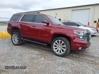 2016 Chevrolet Tahoe LT z VIN 1GNSKBKC9GR454203, wystawiony jako IAAI lot #42198952 z przebiegiem 145 422 mil mil oraz . Historia ofert i sprzedaży dostępna na DreamBid. Obrazek 1.